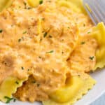 Lobster ravioli topped with a light cream sauce.