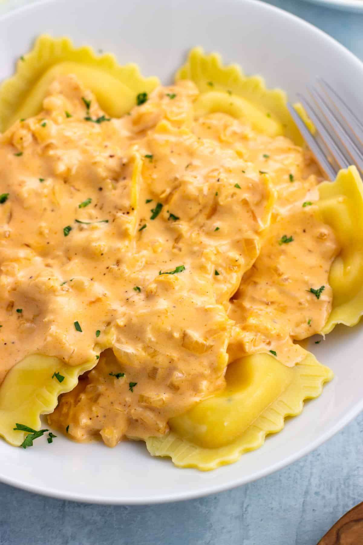 Lobster ravioli topped with a light cream sauce.