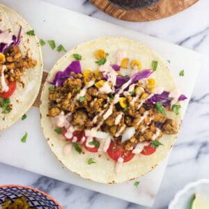 A tempeh taco with a variety of vegetables.