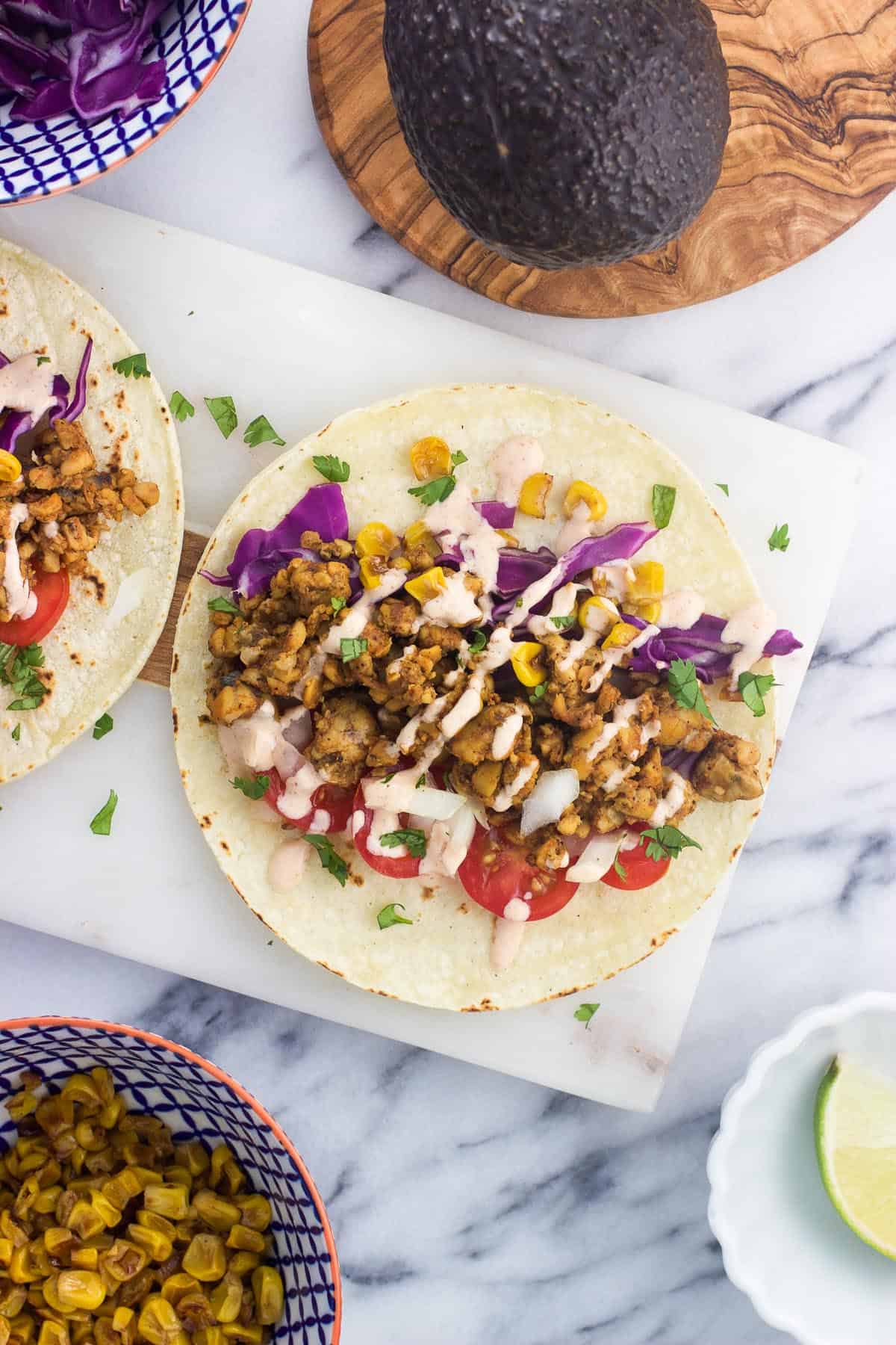 A tempeh taco with a variety of vegetables.