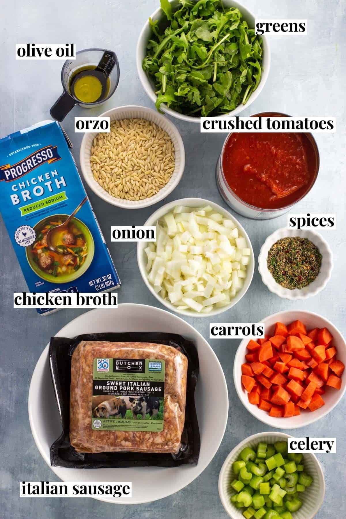 Labeled Italian sausage soup ingredients in separate containers.