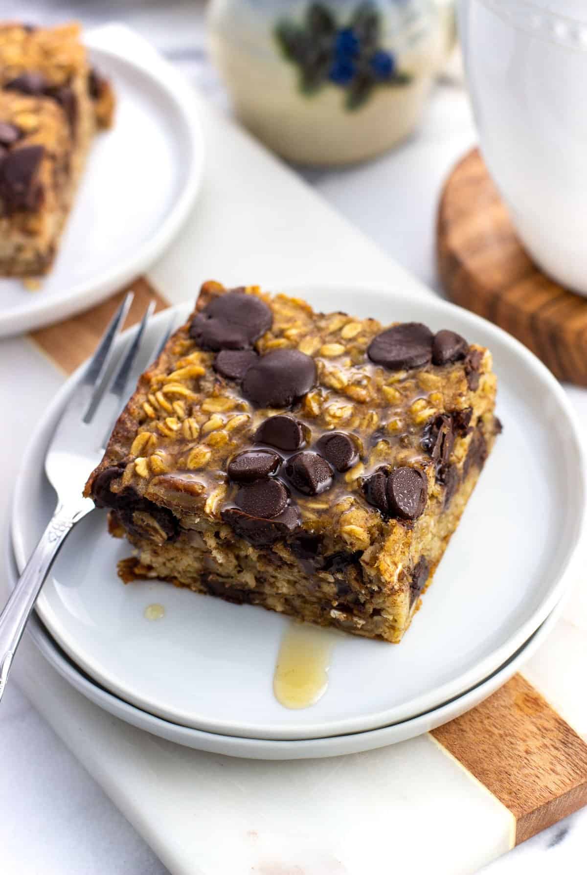 A piece of chocolate chip baked oatmeal on a plate.