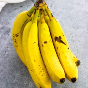 A bunch of six ripe bananas.