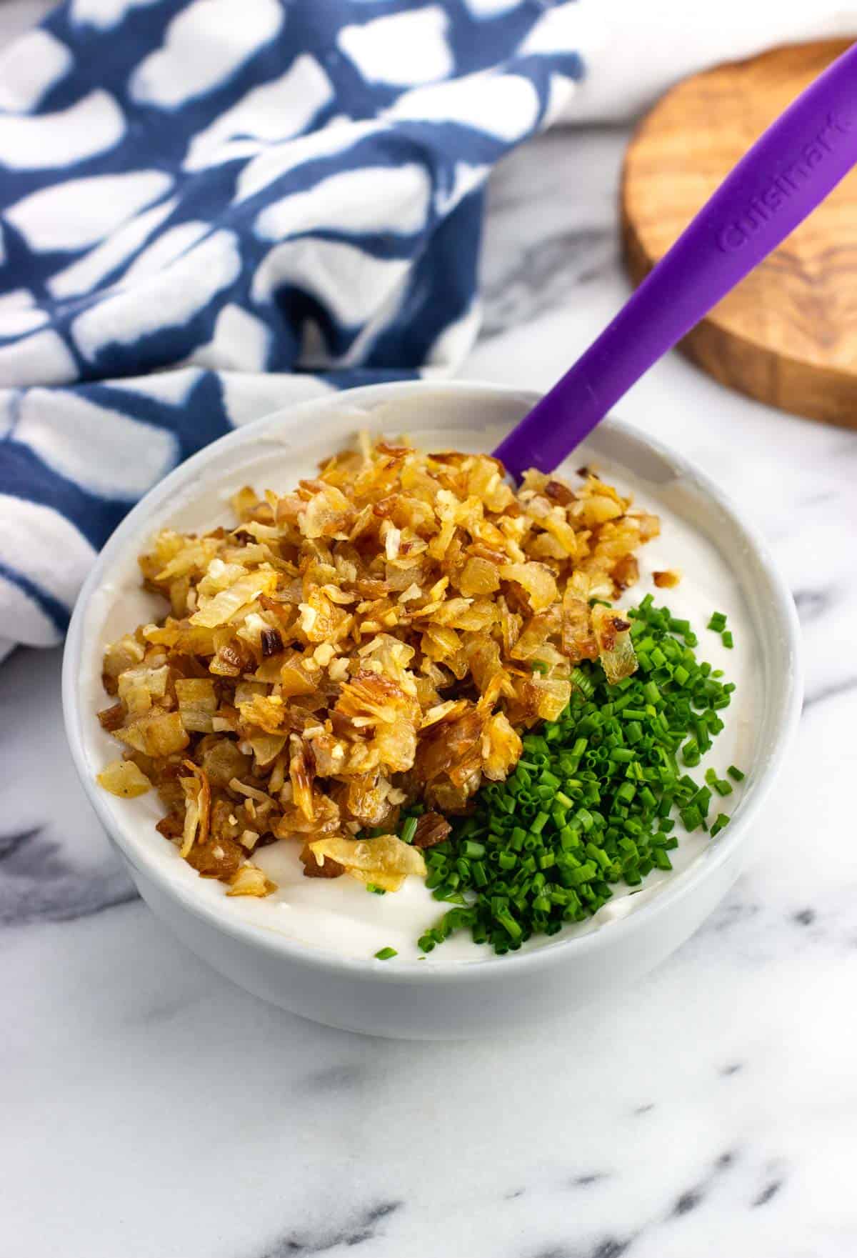 All of the dip ingredients in a bowl before being stirred together.