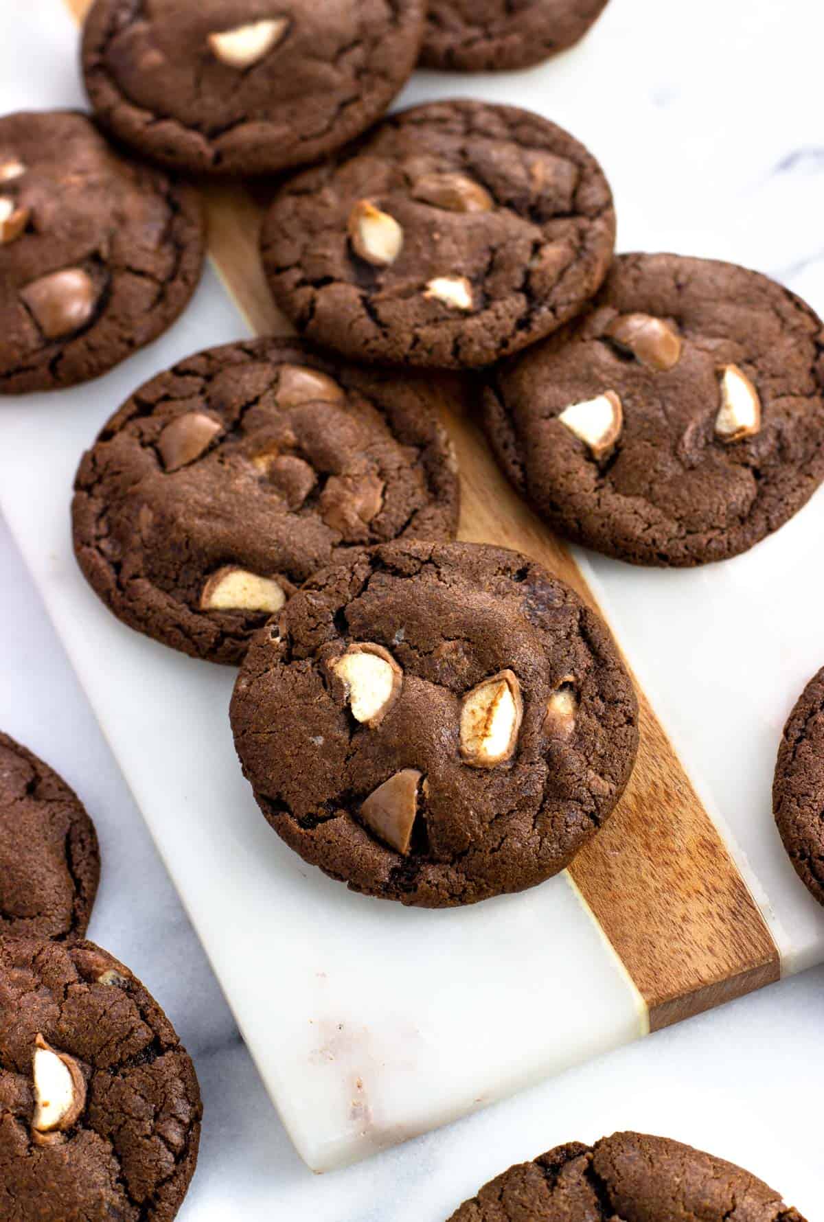 Whoppers cookies on a serving board.