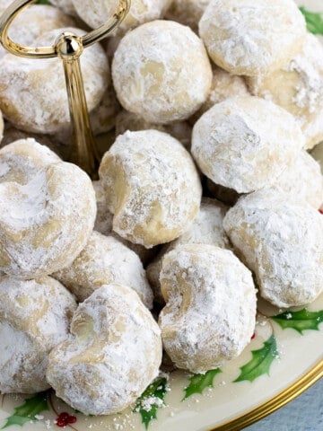 A serving platter of Italian wedding cookies.