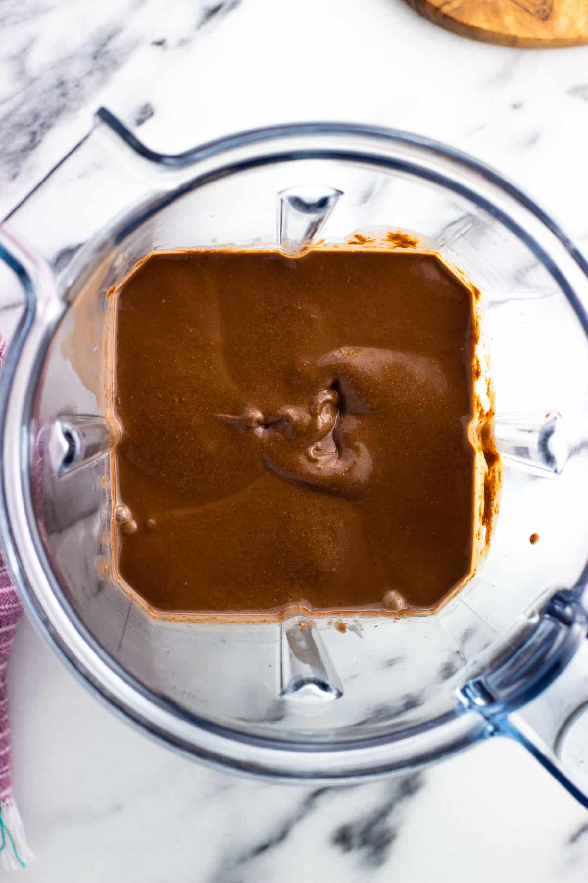 Smooth chocolate chia pudding in a blender.