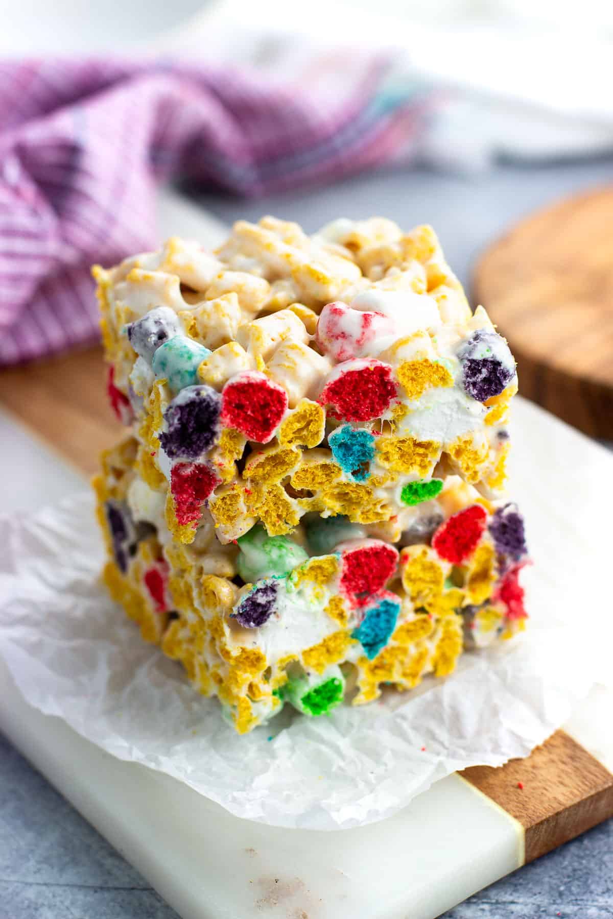 Two Cap'n Crunch cereal treats stacked on top of one another.