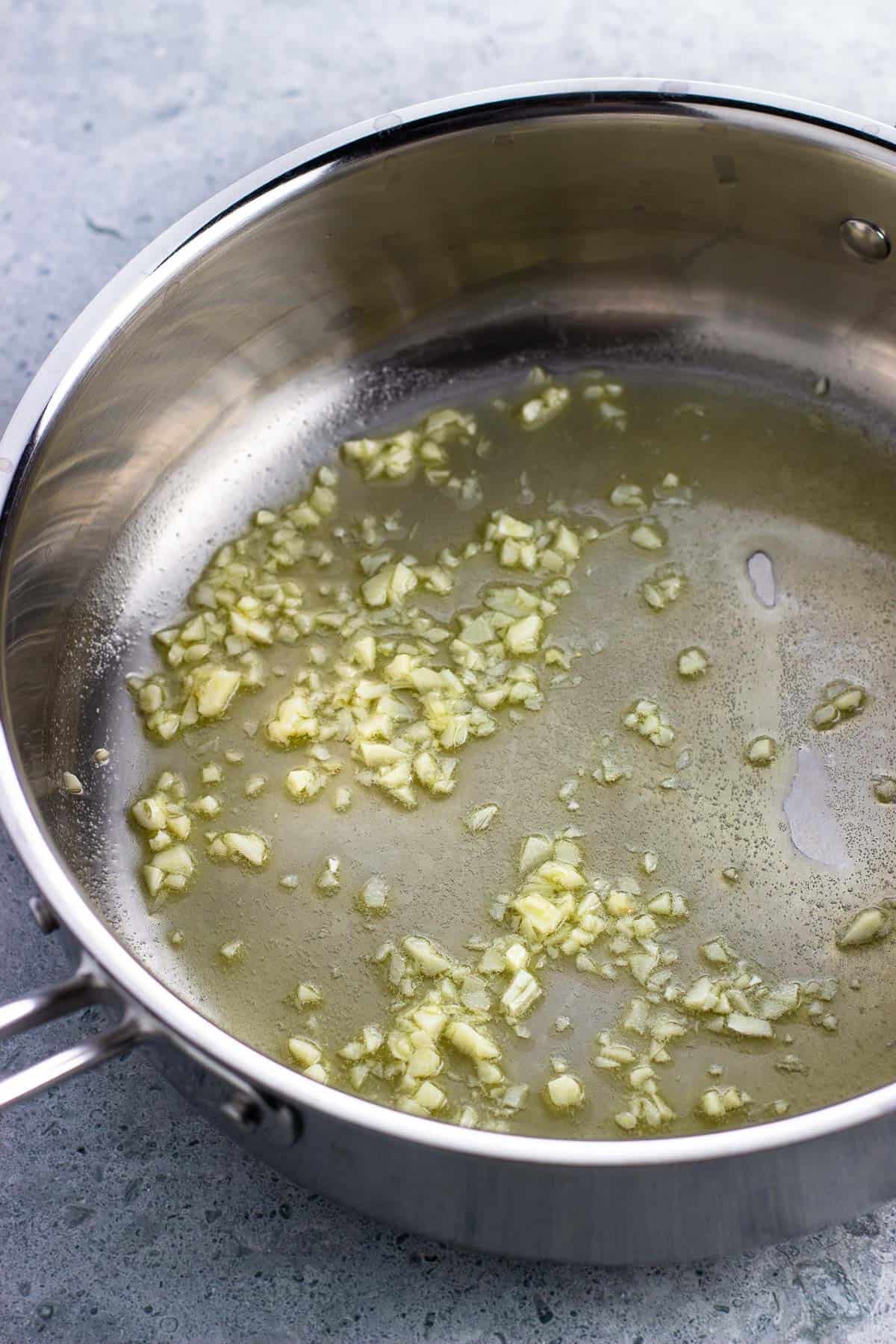 Garlic sauteing in oil and butter.