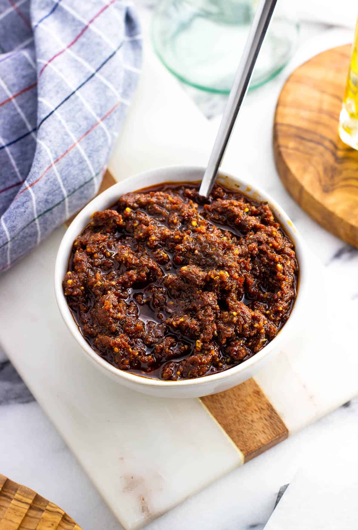 Sun-dried tomato pesto in a ceramic bowl.