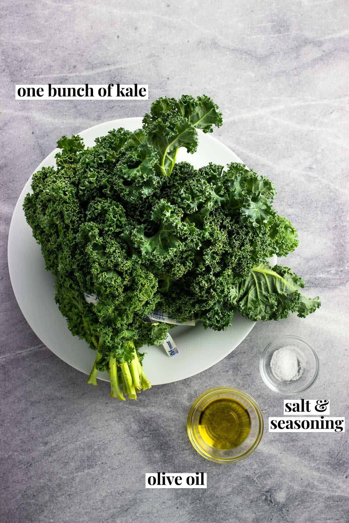 A bunch of kale, olive oil, and salt text labeled with their names.