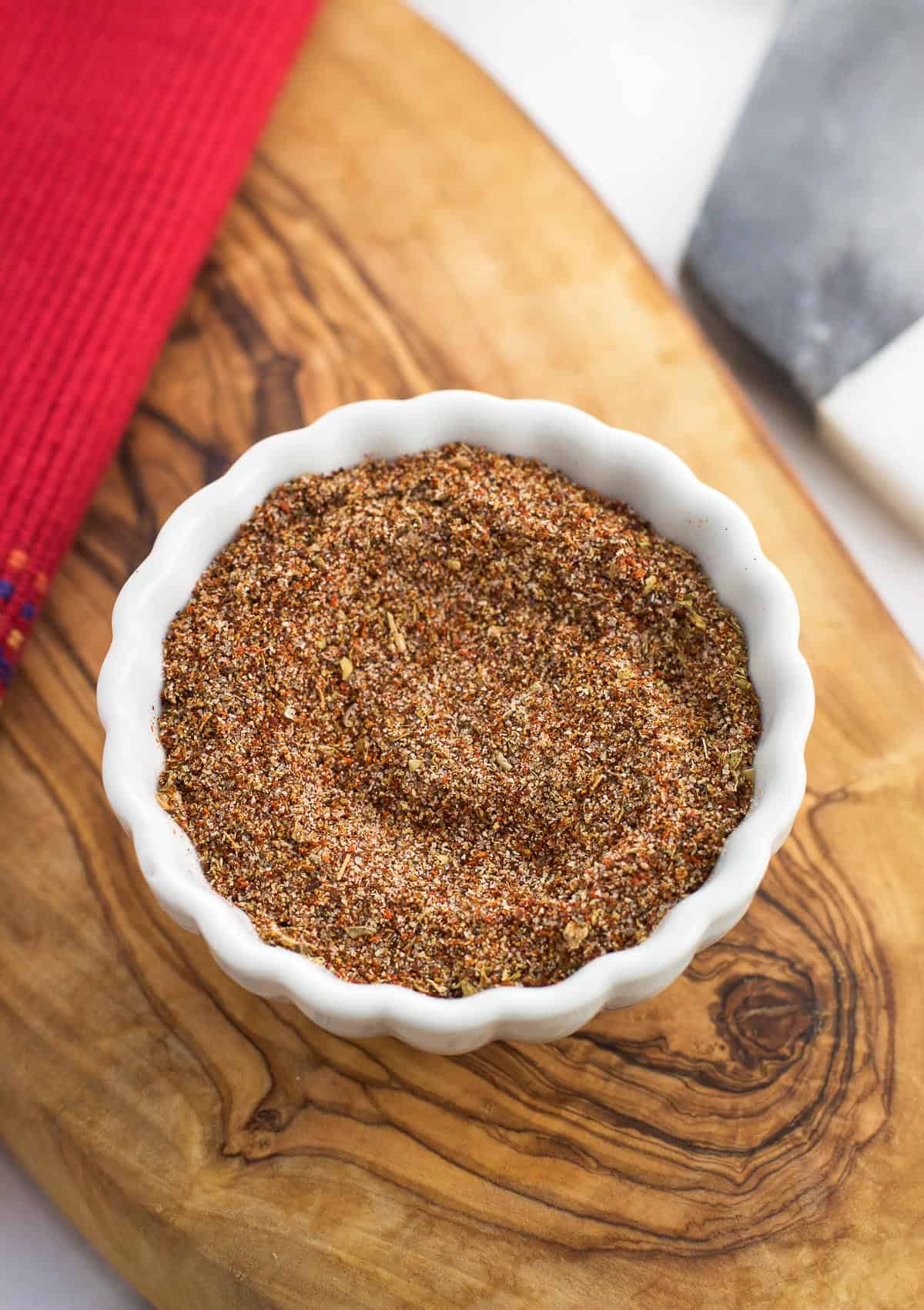 Homemade taco seasoning mixed together in a small bowl.