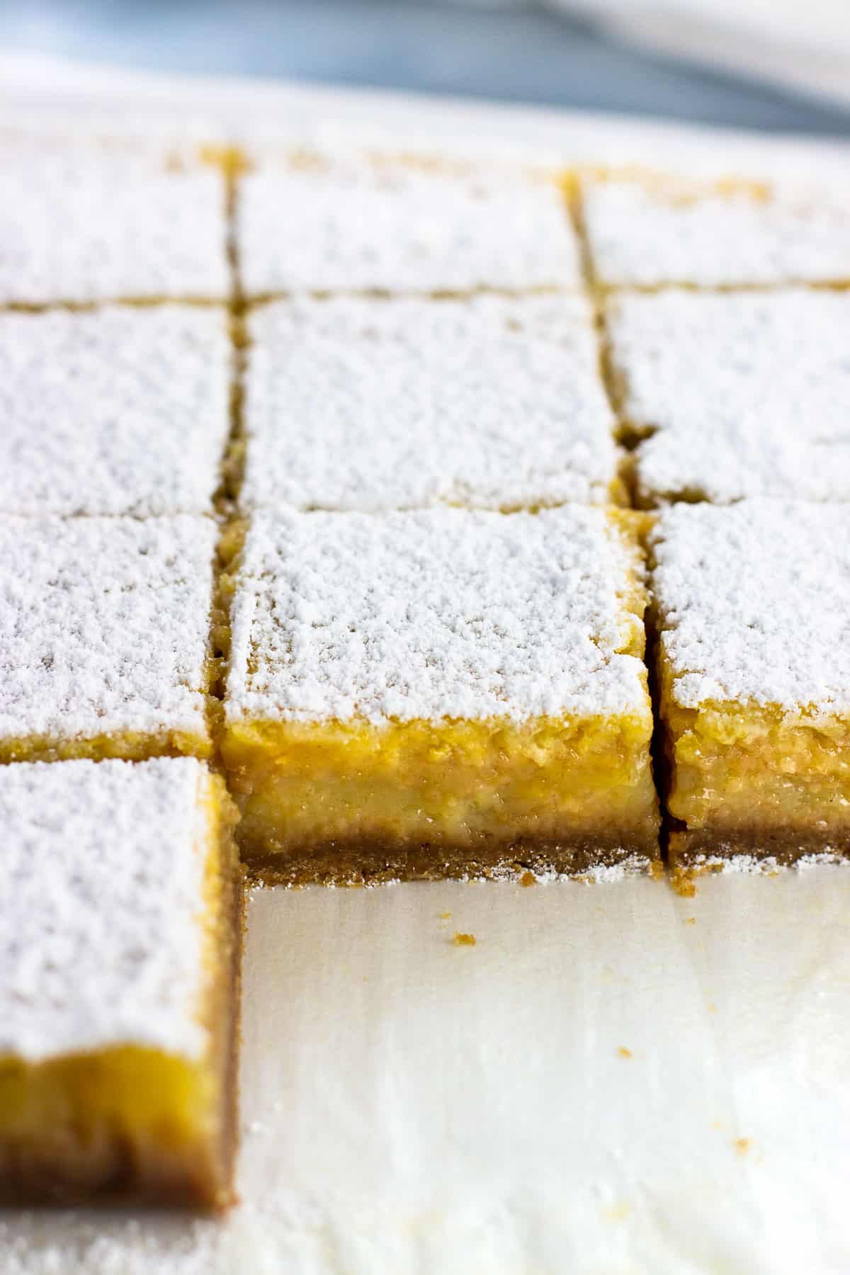 A side view of sliced lemon bars.