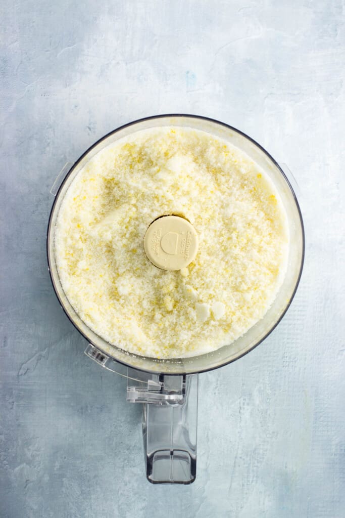 Sugar and lemon zest blitzed together in a food processor.