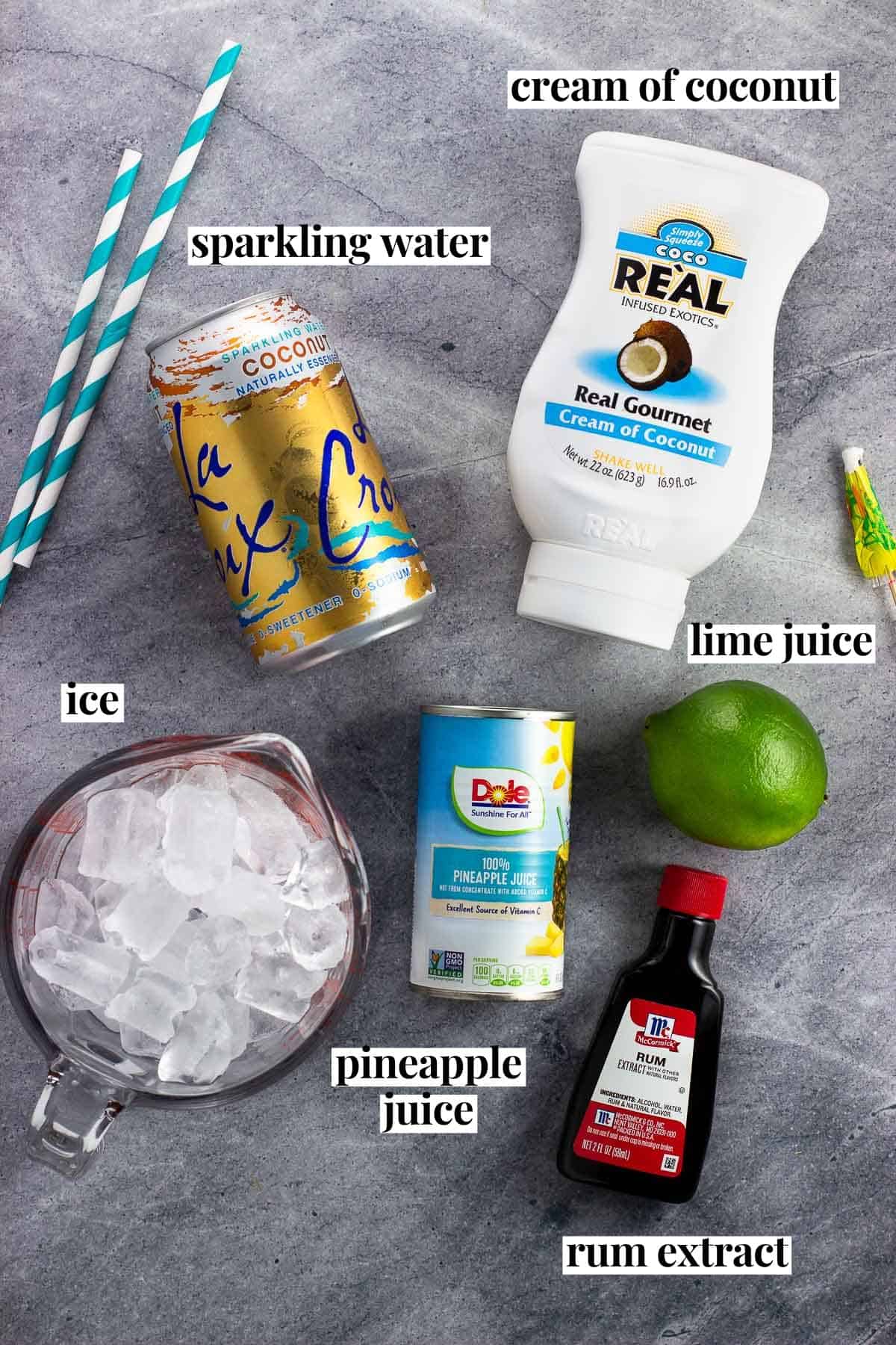 Labeled mocktail ingredients in separate containers.