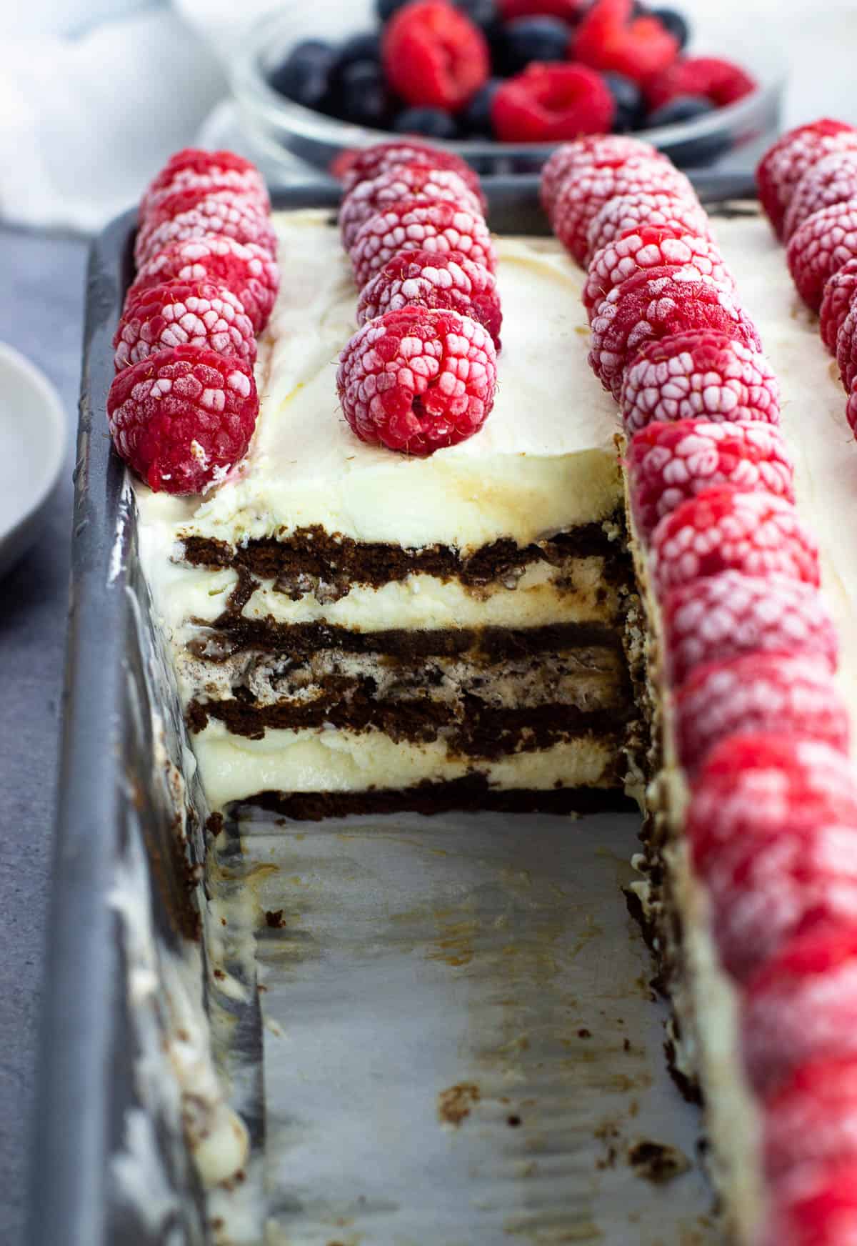 A side view of the sliced frozen cake showing the layers.