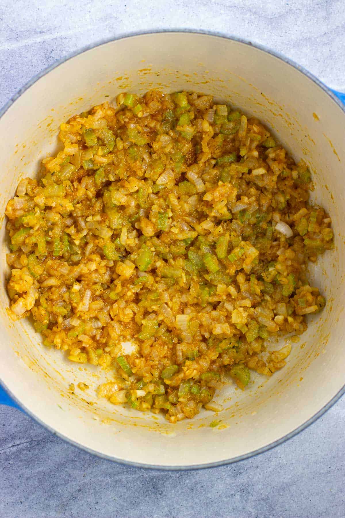 Spices and flour worked into the sautéed vegetables.