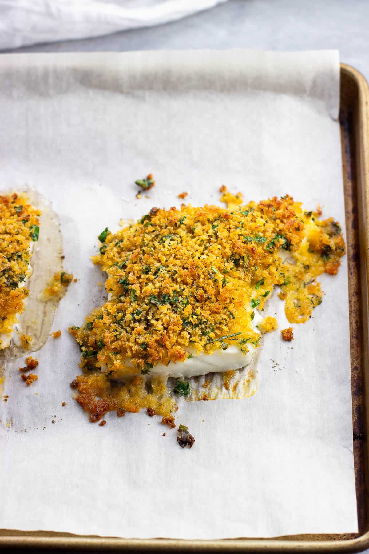 Panko baked cod on a sheet pan.