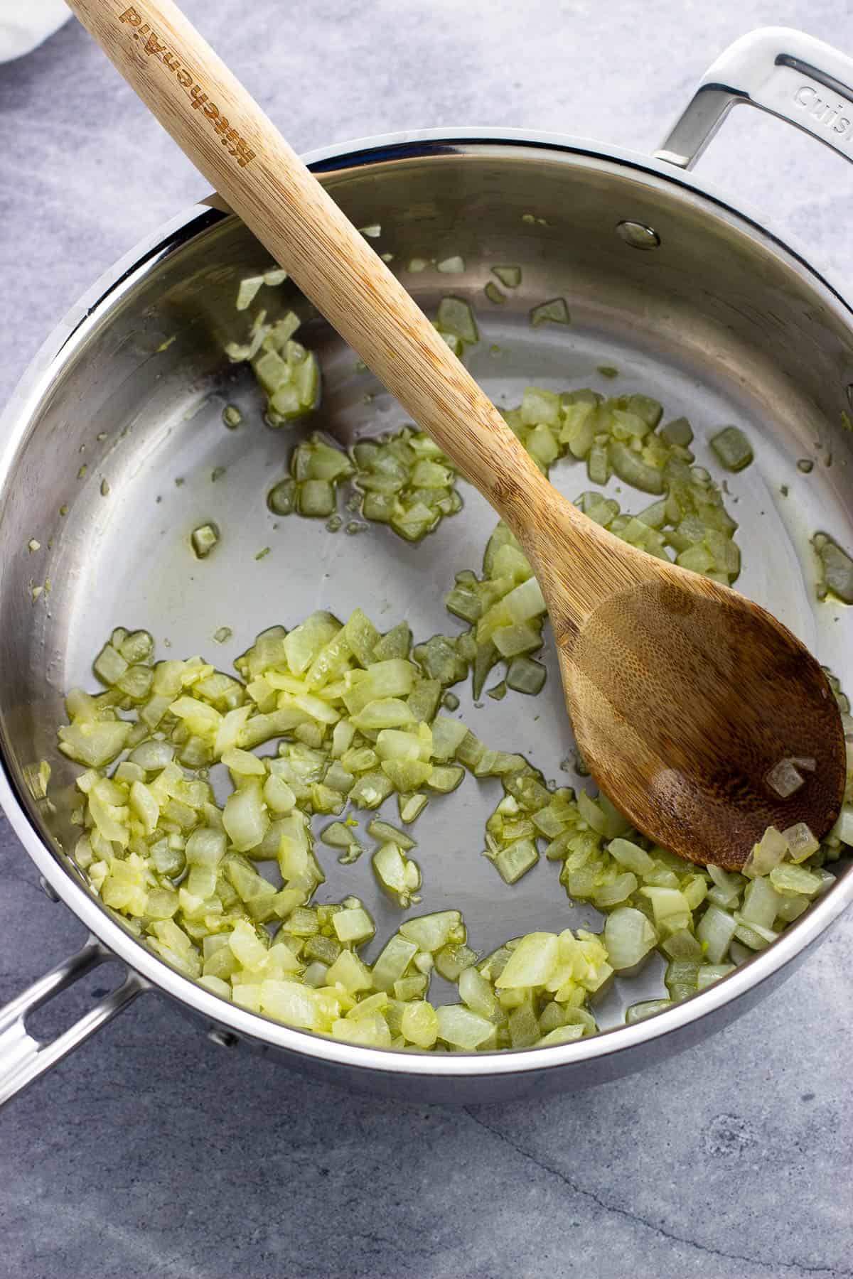 Sautéed onion and garlic in olive oil in a pan.