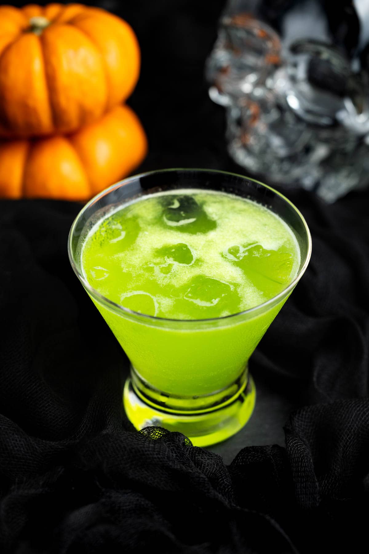 A Halloween Midori margarita served over ice.