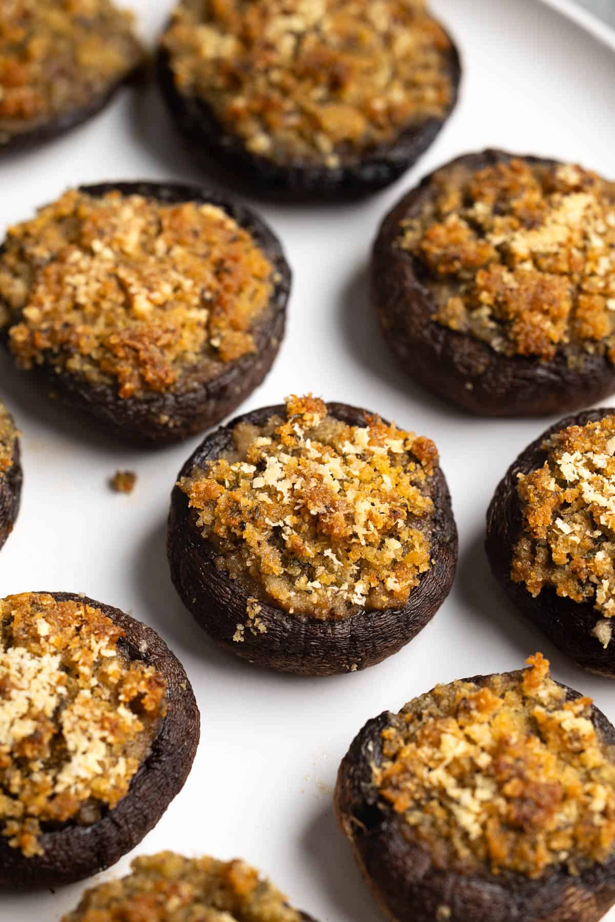 Baked stuffed mushrooms on a plate.