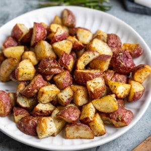 A serving plate of air fryer red potatoes.