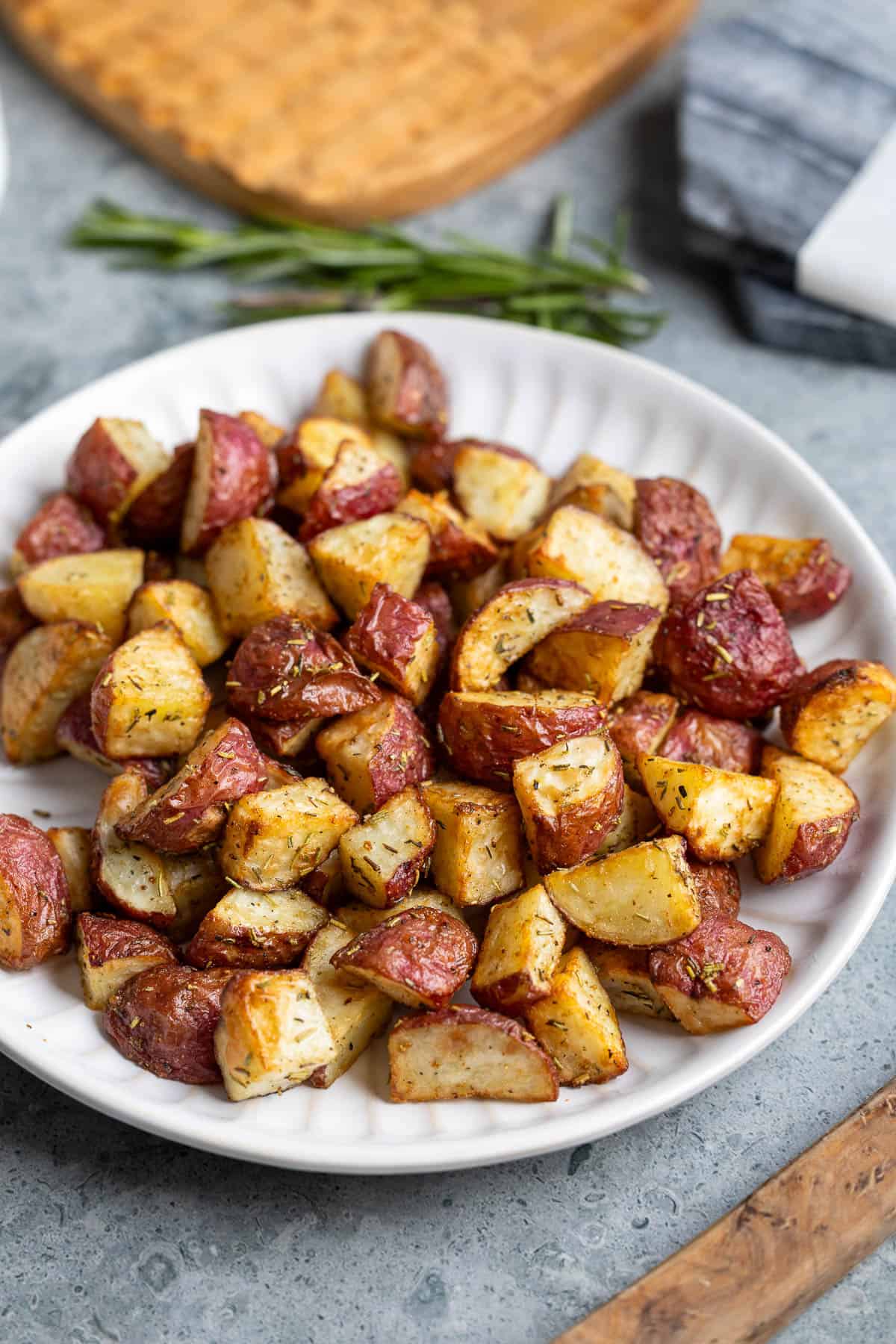 A serving plate of air fryer red potatoes.