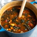 Minestrone soup in a round pot ready to serve.