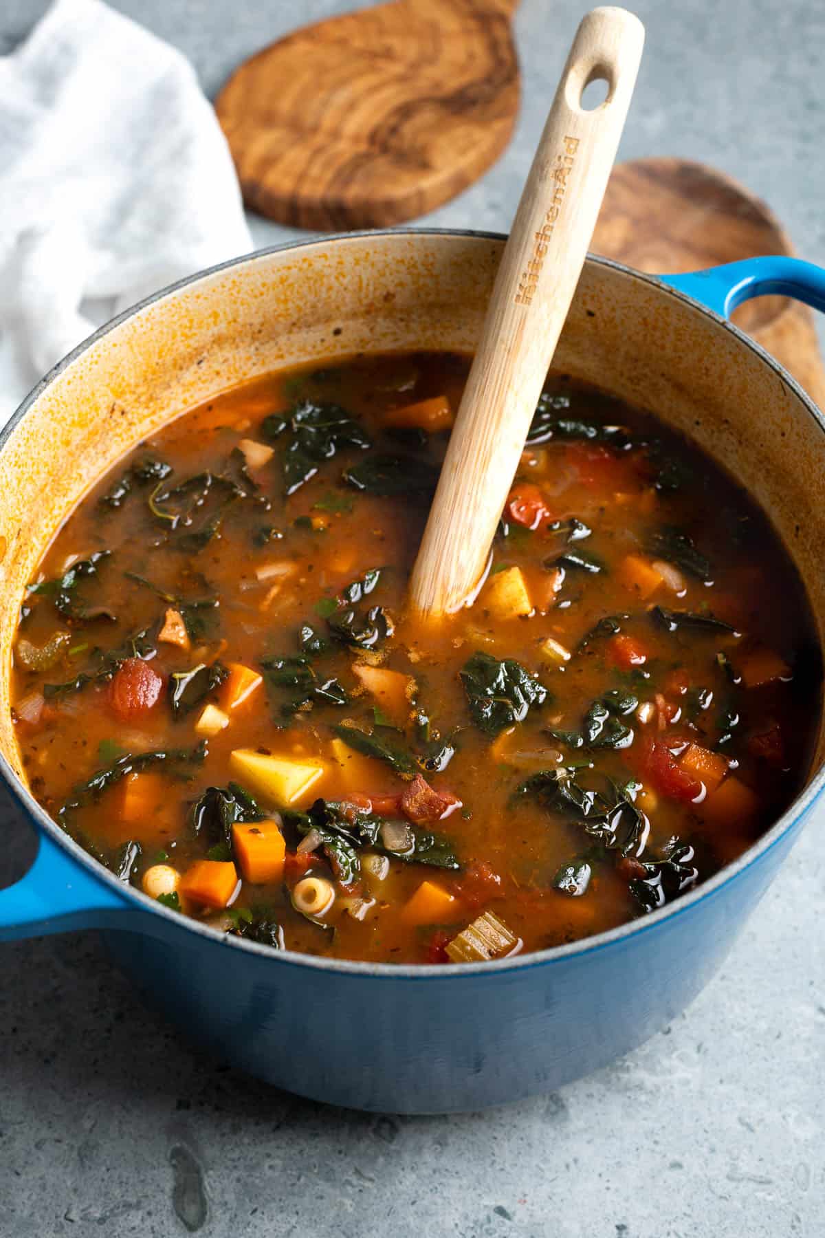 Minestrone soup in a round pot ready to serve.