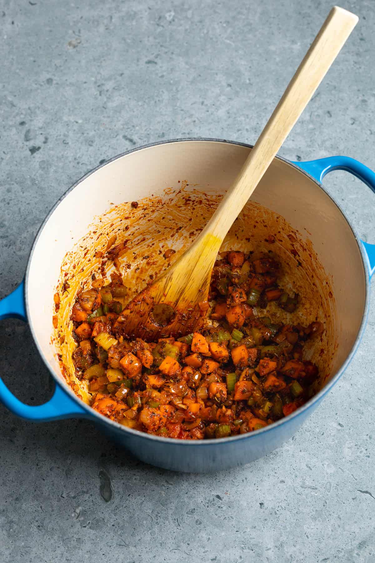 Tomato paste cooked with the vegetables.