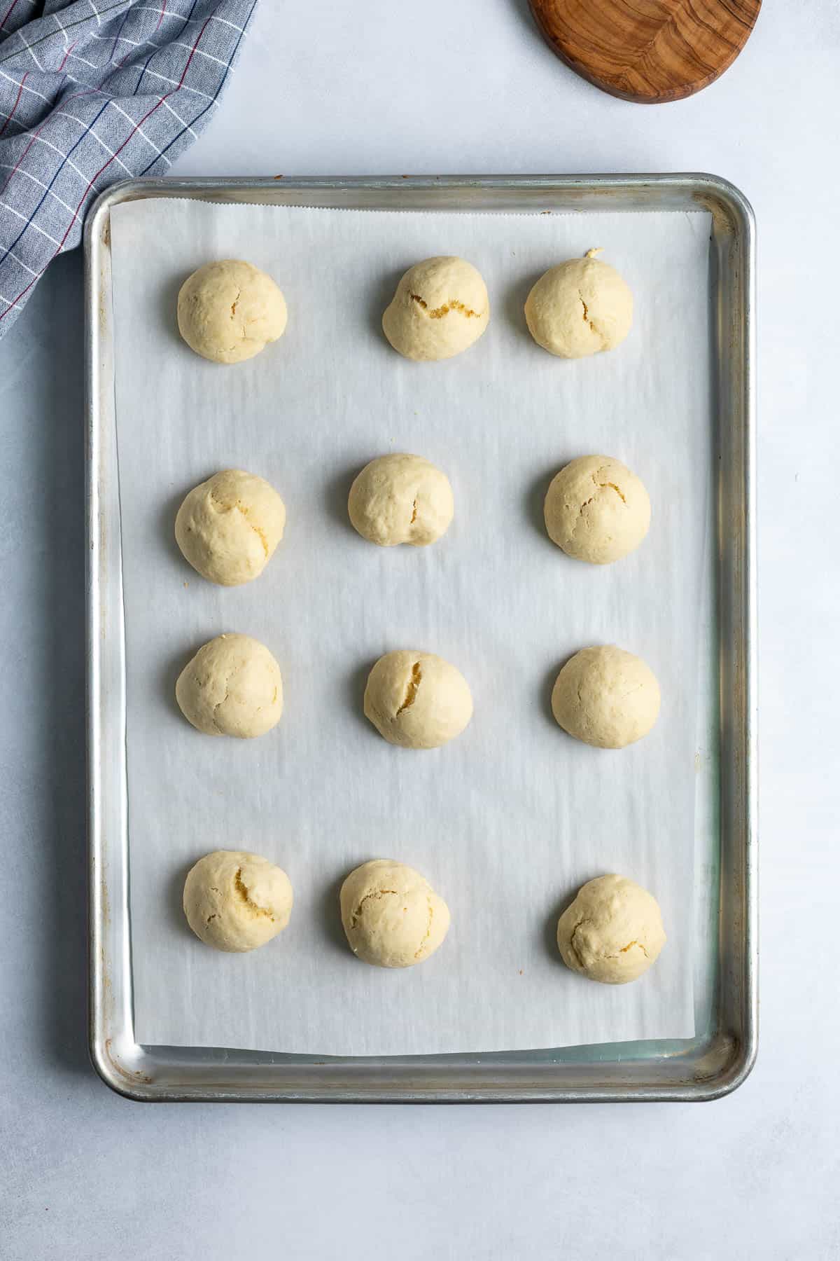 Baked anise cookies on the baking sheet.