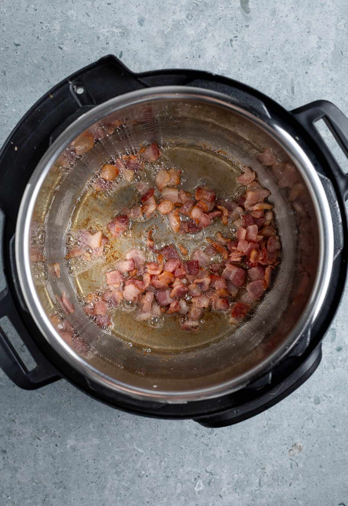 Bacon cooking in an Instant Pot.