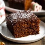 A slice of old-fashioned gingerbread on a dessert plate.