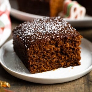 A slice of old-fashioned gingerbread on a dessert plate.