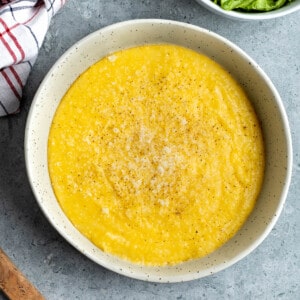 A shallow bowl of polenta made in the Instant Pot.