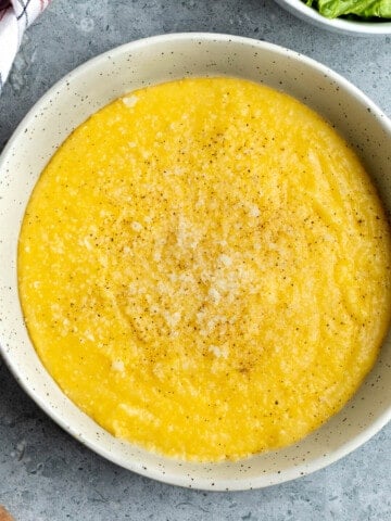A shallow bowl of polenta made in the Instant Pot.