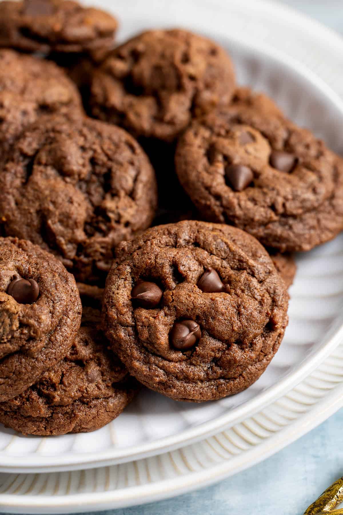 Chocolate orange cookies on a ceramic plate.