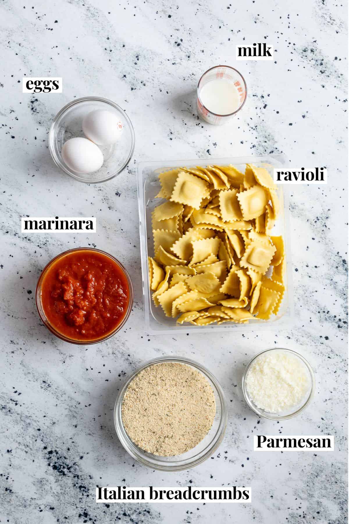 Text-labeled toasted ravioli ingredients in separate containers.