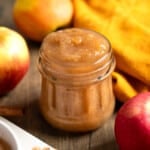 Chunky Instant Pot applesauce in a glass jar.