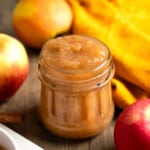 Chunky Instant Pot applesauce in a glass jar.