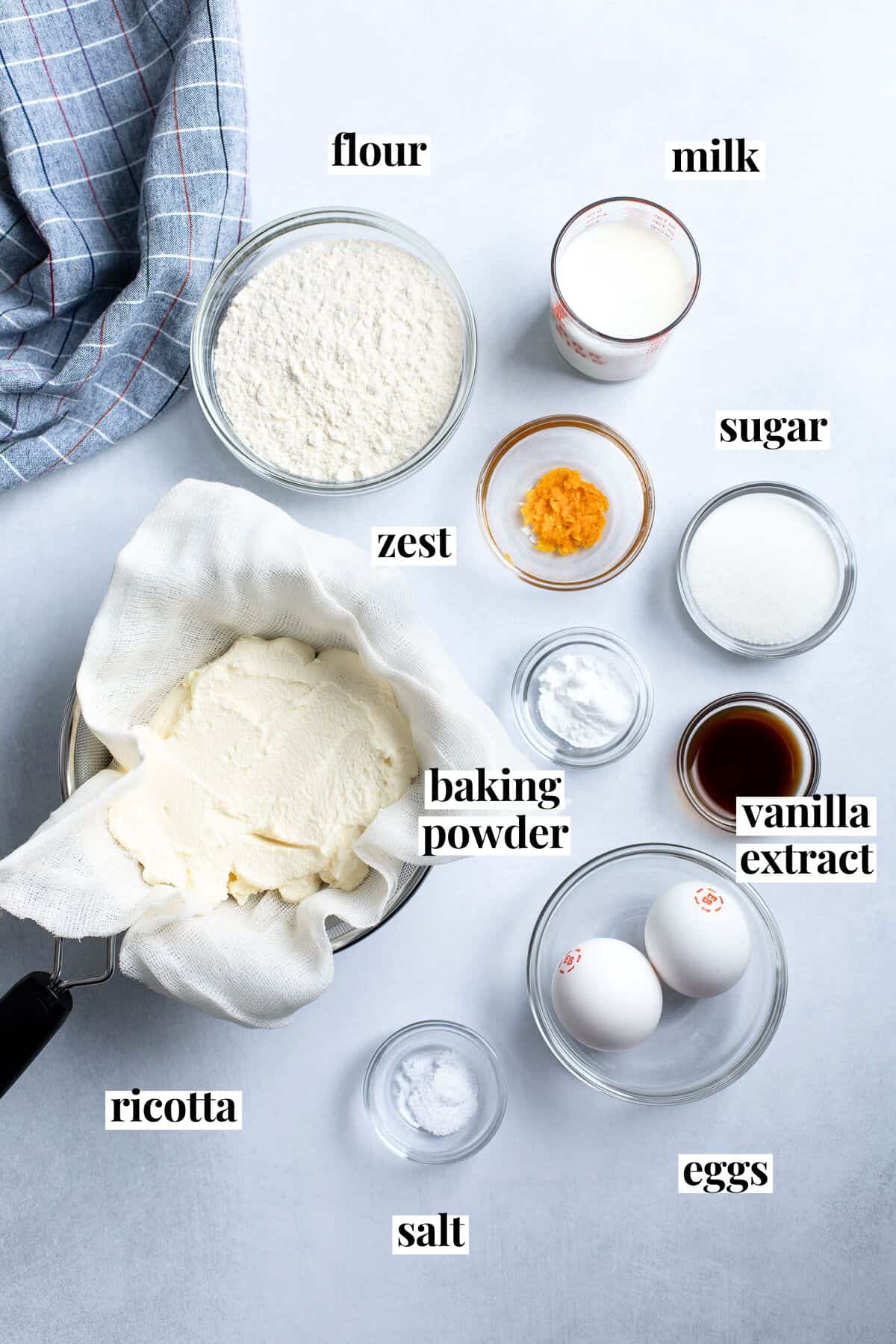 Separate bowls of recipe ingredients text-labeled with their names.
