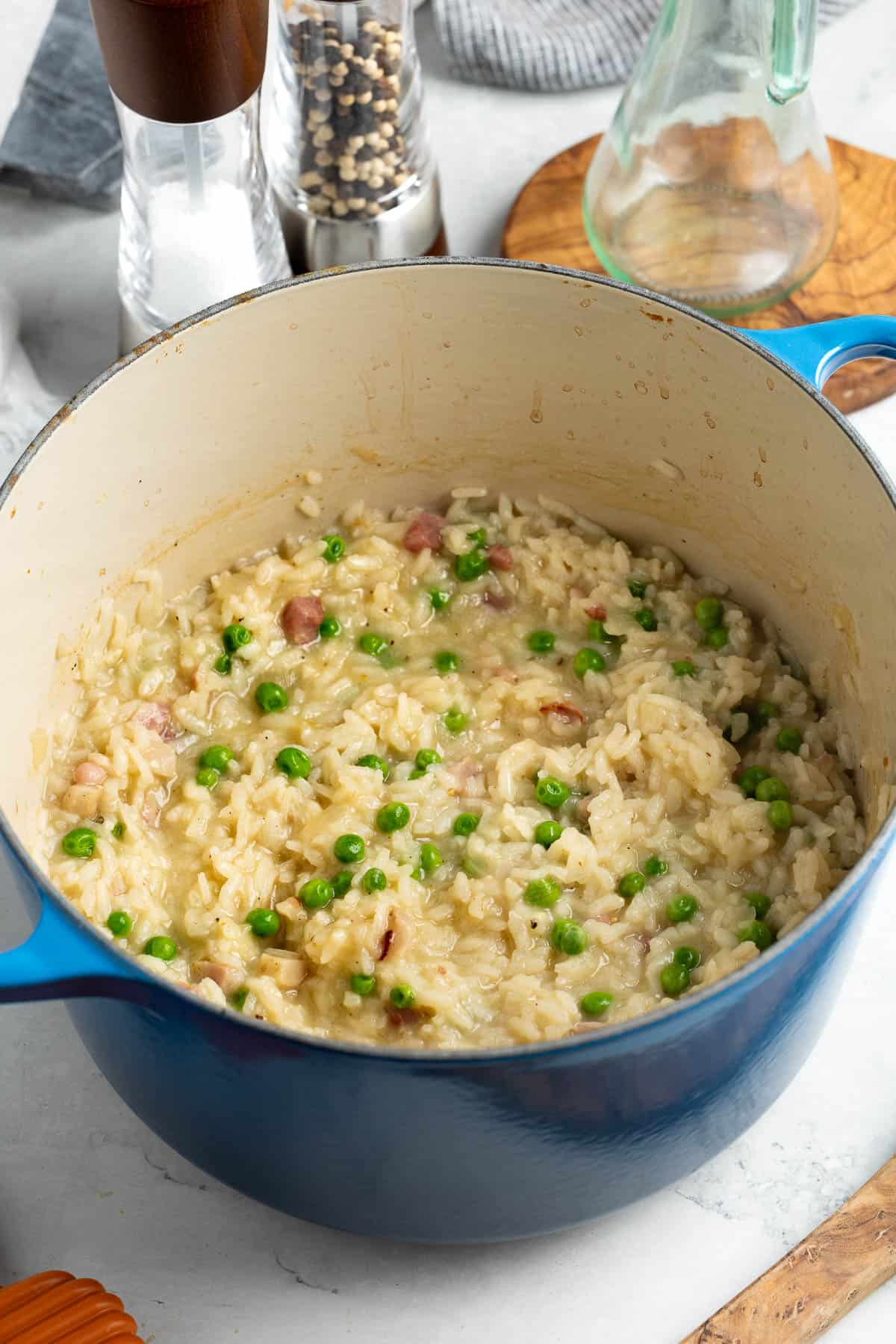 A batch of baked risotto in a Dutch oven.