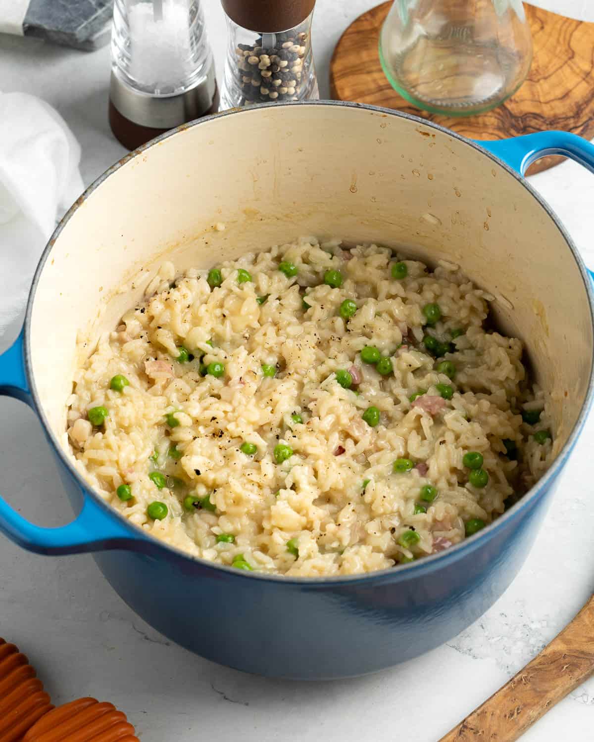 The finished baked risotto in a Dutch oven.