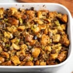 A large baking dish of baked chestnut stuffing.