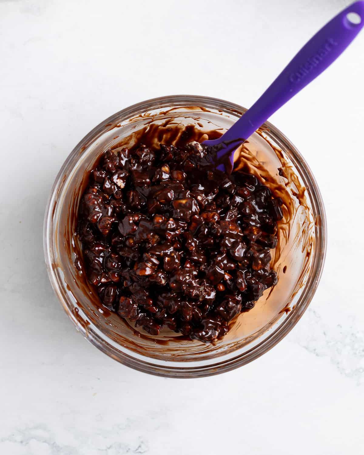 Biscuit and toasted nut pieces stirred into the warm chocolate.