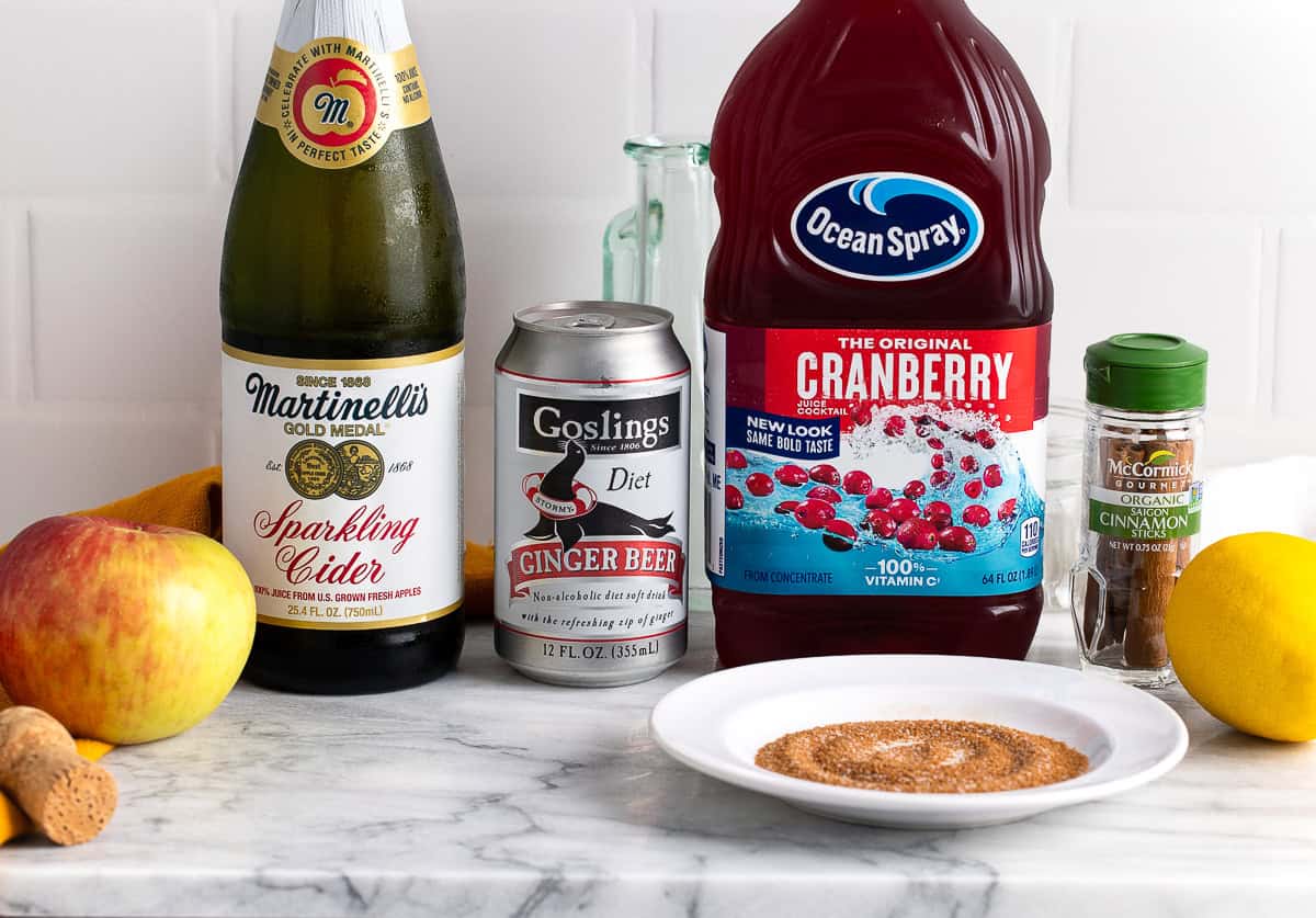 The mocktail ingredients on a marble countertop.