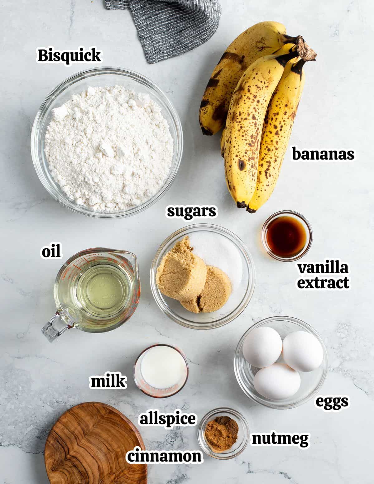 Text-labeled Bisquick banana bread ingredients in separate bowls.