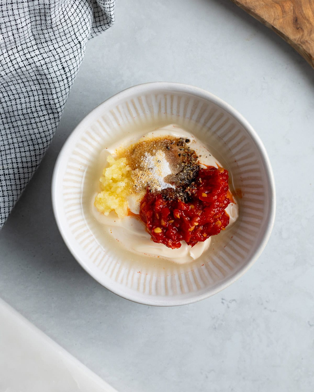 All recipe ingredients added to a ceramic bowl.