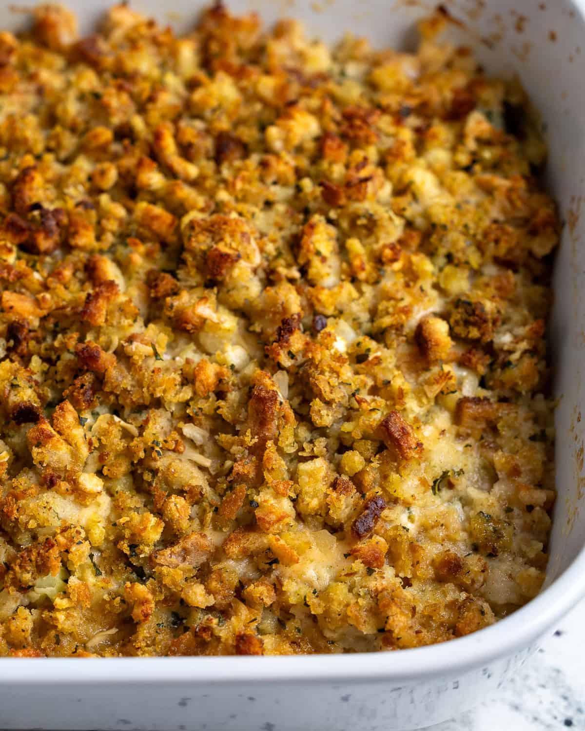 The fully cooked chicken stuffing bake in the baking dish.