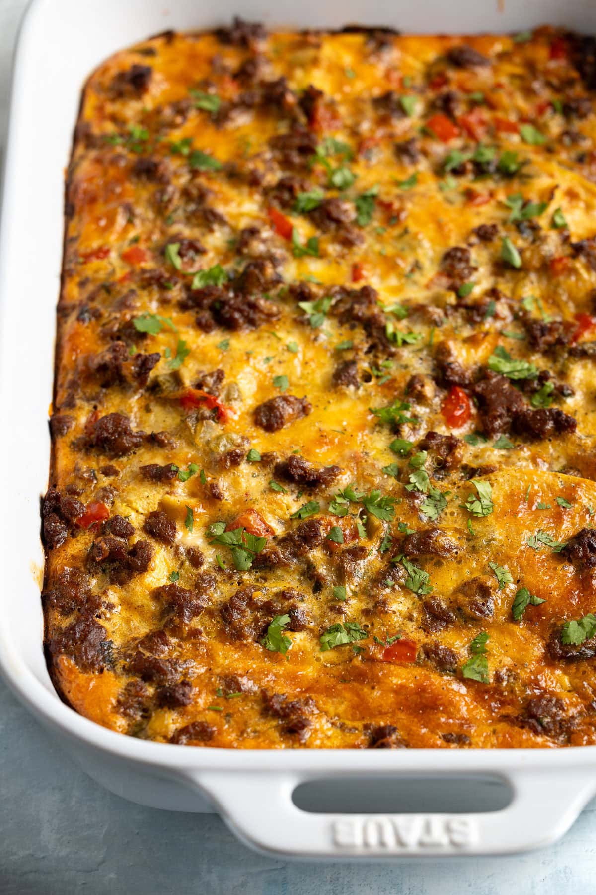 Chorizo cottage cheese egg casserole in a baking dish.